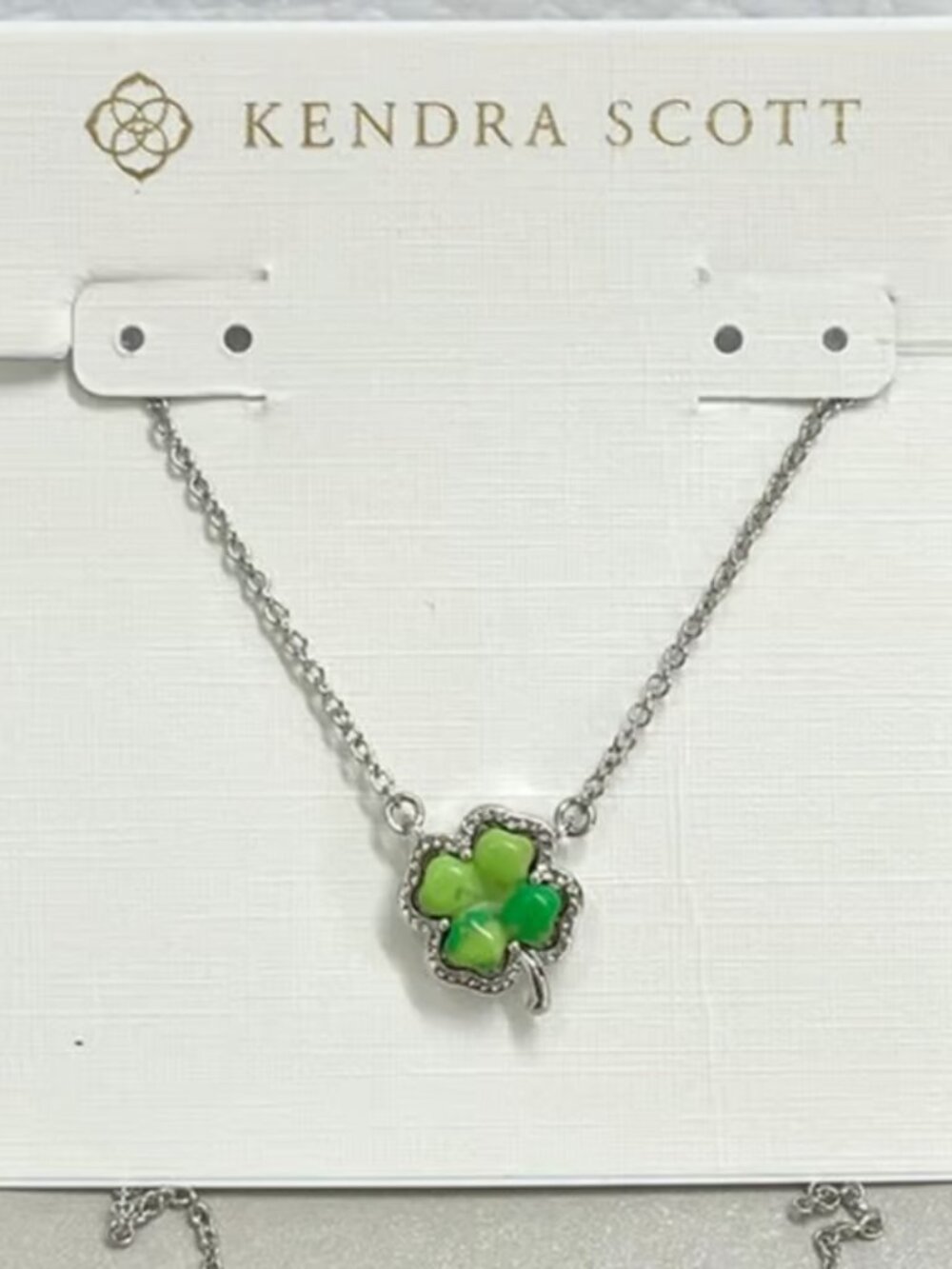 Kendra Scott four lear necklace in silver